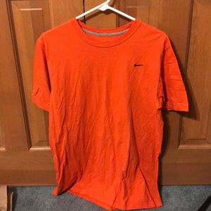 Orange Nike tee shirt